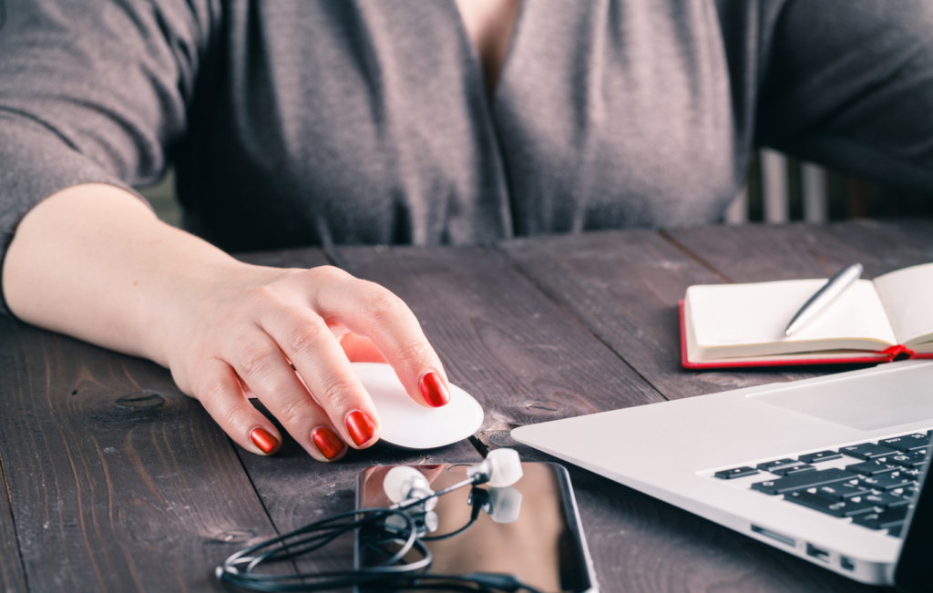 woman clicking mouse button